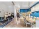 Open floor plan connecting the living room and dining room, filled with natural light and stylish decor at 6801 N 1St Pl, Phoenix, AZ 85012