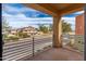 Apartment balcony overlooking a lush green neighborhood at 7601 E Roosevelt St # 1007, Scottsdale, AZ 85257