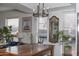 Cozy dining area featuring a wooden table, ample natural light, and stylish decor at 7755 E Thomas Rd # 8, Scottsdale, AZ 85251