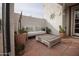 Cozy outdoor patio with comfortable seating and desert landscaping at 7755 E Thomas Rd # 8, Scottsdale, AZ 85251