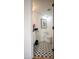 This powder room features patterned floors, creating a unique and stylish design at 7755 E Thomas Rd # 8, Scottsdale, AZ 85251