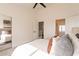 Comfortable bedroom featuring a plush bed, ceiling fan, and mirrored closet doors at 7801 N 44Th Dr # 1059, Glendale, AZ 85301