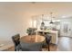 Bright dining area connected to a modern kitchen, ideal for entertaining and everyday dining at 7801 N 44Th Dr # 1059, Glendale, AZ 85301