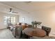 Open living room and dining area featuring stylish furniture and modern ceiling fan at 7801 N 44Th Dr # 1059, Glendale, AZ 85301