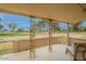 Spacious covered patio with open views of the adjacent green space, ideal for outdoor entertaining at 9402 N 109Th Dr, Sun City, AZ 85351