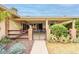 Charming home with well-maintained desert landscape and gated front porch at 9402 N 109Th Dr, Sun City, AZ 85351