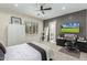 Sleek bedroom design with modern shutters, gaming desk and walk-in closet access at 9781 E Gamble Ln, Scottsdale, AZ 85262