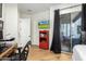 Bedroom with a red bookshelf and sliding glass doors to patio at 9781 E Gamble Ln, Scottsdale, AZ 85262