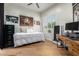 Cozy bedroom with natural light and a wooden desk at 9781 E Gamble Ln, Scottsdale, AZ 85262