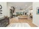 Open-concept living room with hardwood floors and fireplace at 9781 E Gamble Ln, Scottsdale, AZ 85262