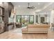 Bright living room featuring a large, open window and modern fireplace at 9781 E Gamble Ln, Scottsdale, AZ 85262