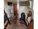 View of the basement featuring a toilet stall and a sink with cabinets at 981 N Sherwood Way, Queen Valley, AZ 85118