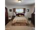 Cozy bedroom features neutral tones, carpet and great natural light at 981 N Sherwood Way, Queen Valley, AZ 85118