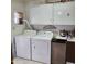 Bright laundry room featuring modern washer and dryer at 981 N Sherwood Way, Queen Valley, AZ 85118