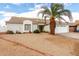 Single-story home featuring desert landscaping at 10216 W Minnezona Ave, Phoenix, AZ 85037