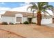 Single-story home featuring desert landscaping at 10216 W Minnezona Ave, Phoenix, AZ 85037