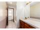 Bathroom features a single sink vanity with tiled counters at 109 W Kathleen Rd, Phoenix, AZ 85023