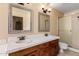 The bathroom includes a double sink vanity and a tiled glass shower at 109 W Kathleen Rd, Phoenix, AZ 85023