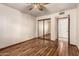 Bedroom includes a mirrored closet, an open door, and a ceiling fan at 109 W Kathleen Rd, Phoenix, AZ 85023