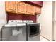 Laundry room featuring modern gray washer and dryer units at 109 W Kathleen Rd, Phoenix, AZ 85023