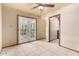 Sun-drenched room with tile flooring and French doors, perfect for enjoying natural light and outdoor views at 109 W Kathleen Rd, Phoenix, AZ 85023