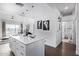 Bright kitchen featuring stainless steel appliances and an island with bar stool seating at 1130 N 2Nd St # 411, Phoenix, AZ 85004