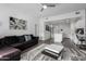 Inviting living room flowing into a bright kitchen featuring stainless steel appliances and island at 1130 N 2Nd St # 411, Phoenix, AZ 85004