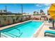 Inviting outdoor pool area includes lounge chairs and a barbecue area for relaxing and entertaining at 1130 N 2Nd St # 411, Phoenix, AZ 85004