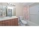 Bathroom featuring vanity with sink, mirror, and shower with curtain at 11388 N 114Th Dr, Youngtown, AZ 85363