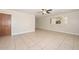 Large living room area with tile floors and neutral walls at 11388 N 114Th Dr, Youngtown, AZ 85363