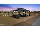 Backyard gazebo with comfortable seating and a built-in grill, perfect for outdoor relaxation at 12806 W Jadestone Dr, Sun City West, AZ 85375