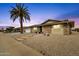 Charming home featuring low maintenance landscaping, solar panels, and a two-car garage at 12806 W Jadestone Dr, Sun City West, AZ 85375