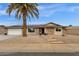 Charming home featuring low maintenance landscaping, solar panels, and a two-car garage at 12806 W Jadestone Dr, Sun City West, AZ 85375