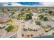 An aerial view of a neighborhood showcasing community layout and individual homes at 1349 E Anasazi St, Mesa, AZ 85203