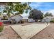 Lush backyard featuring a covered pool, outdoor grill and storage shed at 1349 E Anasazi St, Mesa, AZ 85203