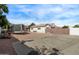 Expansive backyard with concrete and gravel areas with ample space for parking at 1349 E Anasazi St, Mesa, AZ 85203