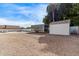 Spacious side yard with a large shed and a car trailer at 1349 E Anasazi St, Mesa, AZ 85203