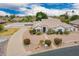 Beautiful desert home with a circular driveway and lush desert landscaping at 1349 E Anasazi St, Mesa, AZ 85203