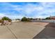 Large lot with concrete driveway, suitable for RV or boat parking at 1349 E Anasazi St, Mesa, AZ 85203