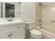 A well-lit bathroom with a shower and tub combo at 14408 N 35Th Ave, Phoenix, AZ 85053