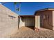 A partially enclosed storage shed is located in the backyard at 14408 N 35Th Ave, Phoenix, AZ 85053