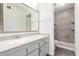 Light and airy bathroom with vanity and tiled shower stall at 14851 N 25Th Dr # 11, Phoenix, AZ 85023