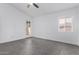 Bright bedroom featuring tile floors, natural light, and access to outdoor space at 14851 N 25Th Dr # 11, Phoenix, AZ 85023