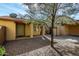 Home's front yard featuring desert landscaping and a covered porch with view of front entryway at 14851 N 25Th Dr # 11, Phoenix, AZ 85023