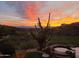 Backyard features a spa with views of the sunrise over the desert landscape at 15504 E Firerock Country Club Dr, Fountain Hills, AZ 85268