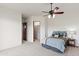 Bedroom features a ceiling fan and carpeting at 15504 E Firerock Country Club Dr, Fountain Hills, AZ 85268