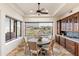 Cozy breakfast nook with a round table, comfortable chairs, and natural light, perfect for casual dining at 15504 E Firerock Country Club Dr, Fountain Hills, AZ 85268