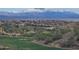 Scenic community view showcasing well-maintained landscaping, golf course, and snow-capped mountains at 15504 E Firerock Country Club Dr, Fountain Hills, AZ 85268