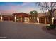 Elegant covered entrance with custom stonework and beautiful architectural details at 15504 E Firerock Country Club Dr, Fountain Hills, AZ 85268