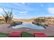 Beautiful infinity pool overlooking a stunning desert landscape, perfect for relaxation and entertainment at 15504 E Firerock Country Club Dr, Fountain Hills, AZ 85268